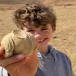 a-young-boy-found-roman-statuette-piece.jpg