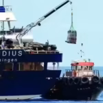 the-cruise-ship-mv-hondius-affected-by-a-hantavirus-outbreak-receives-a-delivery-at-the-port-of-gran.avif