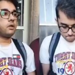 indian-man-being-confronted-by-a-group.jpg
