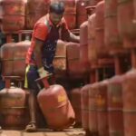 mumbai-a-worker-unloads-domestic-lpg-gas-cylinders-from-a-truck-in-mumbai-oil.jpg