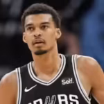 victor-wembanyama-reacts-after-fans-courtside-selfie-attempt-during-nba-finals-ends-in-lifetime-ban.avif