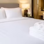hotels-use-white-bedsheets-and-towels-even-though-they-show-every-stain-and-the-reason-is-surprising.avif