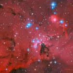 nasas-hubble-captures-a-spectacular-red-white-and-blue-stellar-nursery-where-thousands-of-stars-are.avif