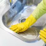 woman-cleaning-sink.jpg