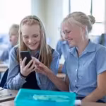 a-new-kansas-law-bars-students-from-accessing-phones-earbuds-and-smartwatches-all-school-day-while-o.avif