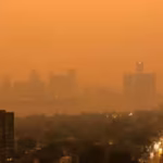 michigans-aqi-hit-616-after-ontario-wildfire-smoke-crossed-into-the-us-scientists-warn-a-warming-cli.avif