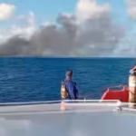 smoke-from-the-passenger-ferry-that-caught-fire-while-traveling-from-the-tourist-island-of-bali-to-n.avif