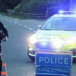 a-police-officer-blocks-a-road-near-the-raf-fairford-airbase-in-fairford.jpg