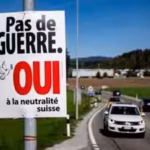 an-electoral-poster-reads-no-war-yes-to-swiss-neutrality-is-posted-along-a-road-in-epagny-switzerlan.avif