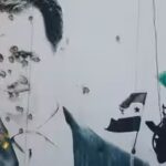 file-photo-a-billboard-with-a-picture-of-syrias-bashar-al-assad-shows-damage-by-bullet-holes.jpg