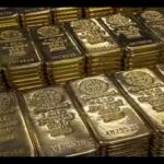 gold-prices-tumble-as-crude-surge-stronger-dollar-fuel-rate-cut-worries.jpg
