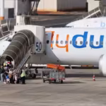 1792119880_travelers-board-a-flydubai-aircraft-at-ben-gurion-international-airport-after-a-separate-flydubai-fl.avif