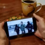 a-person-watches-a-news-feed-running-a-russias-fsb-security-service-footage-of-the-operation-to-deta.avif