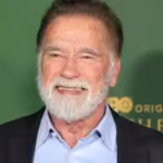 after-the-shelters-were-installed-schwarzenegger-visited-the-site-and-met-some-of-the-veterans-who-w.avif