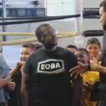 eoba-director-howard-solomon-with-steph-curry-and-ayesha-curry-image-cbs-news.jpg