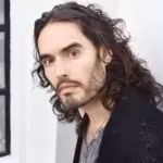 russell-brand-faces-trial-in-london-over-seven-charges-involving-six-women-including-rape-and-sexual.avif