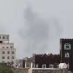 smoke-rises-after-reports-of-an-airstrike-hitting-near-the-sanaa-international-airport.jpg