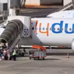travelers-board-a-flydubai-aircraft-at-ben-gurion-international-airport-after-a-separate-flydubai-fl.avif