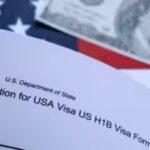 us-flag-mock-passport-100-dollar-banknote-and-h-1b-visa-application-form.jpg