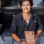 yepez-with-the-award.jpg